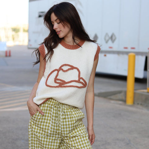 women's vest with a cowboy hat design on the front