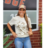 Brans on a tan crew neck shirt 