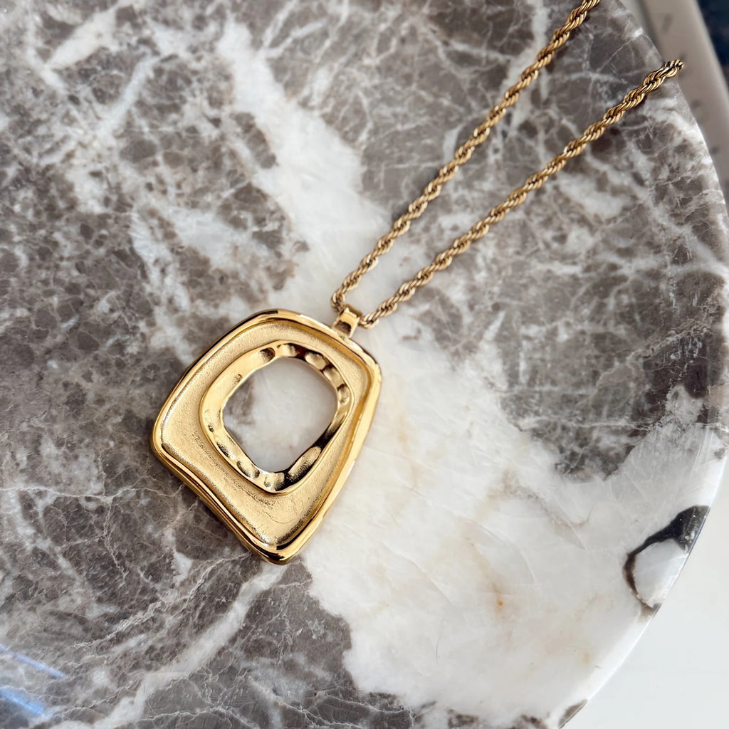 Close up view of Large Gold Square "Taylor" Necklace 