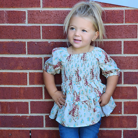 Ivory with flowers and cowgirls, tunic style shirt, puff half sleeves 