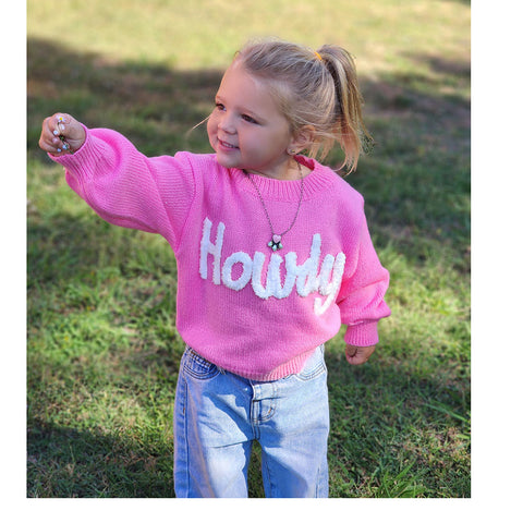Pink sweater with Howdy across the chest in white, bubble sleeves 