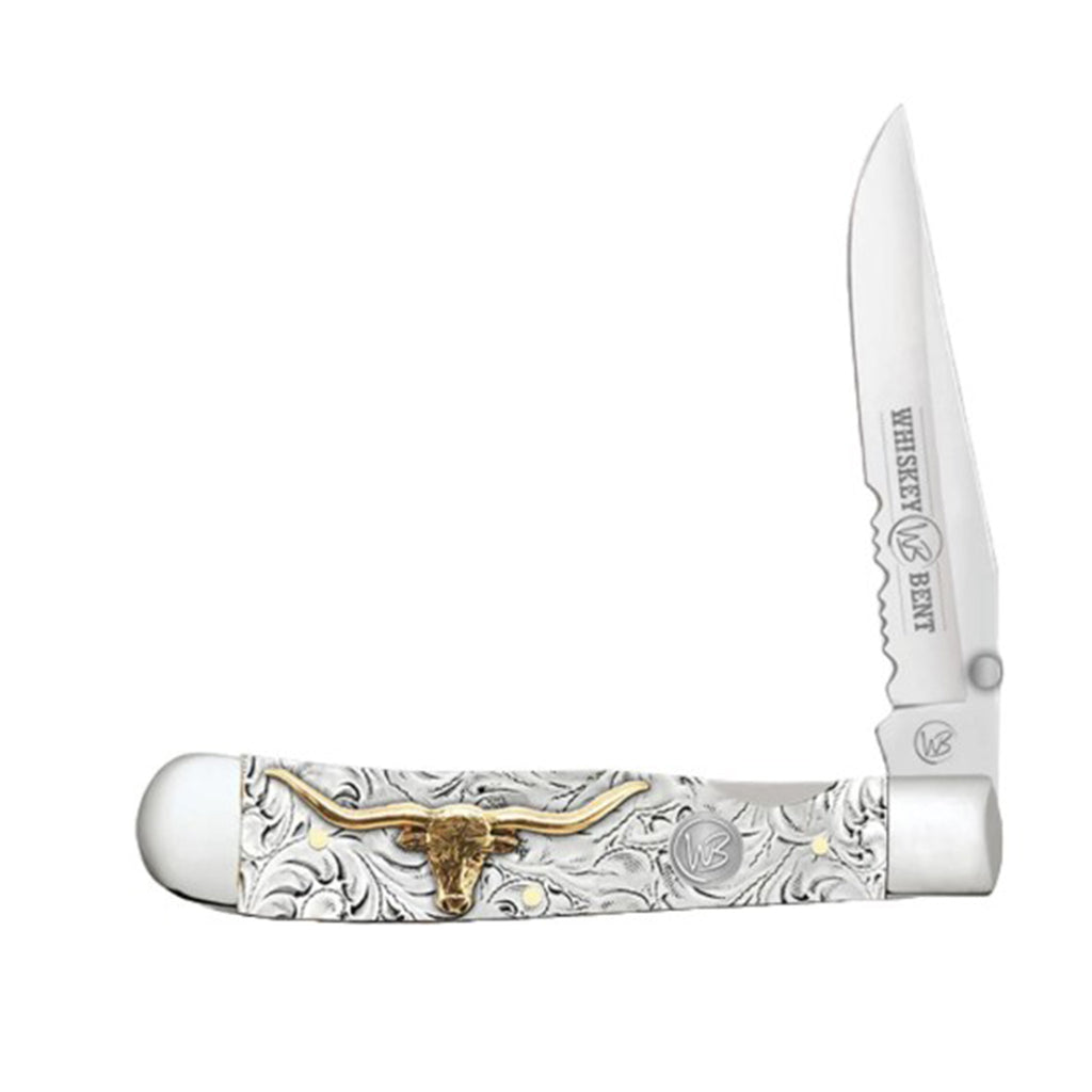 Folding knife with tooled silver and gold steer and whiskey bent design on the blade.