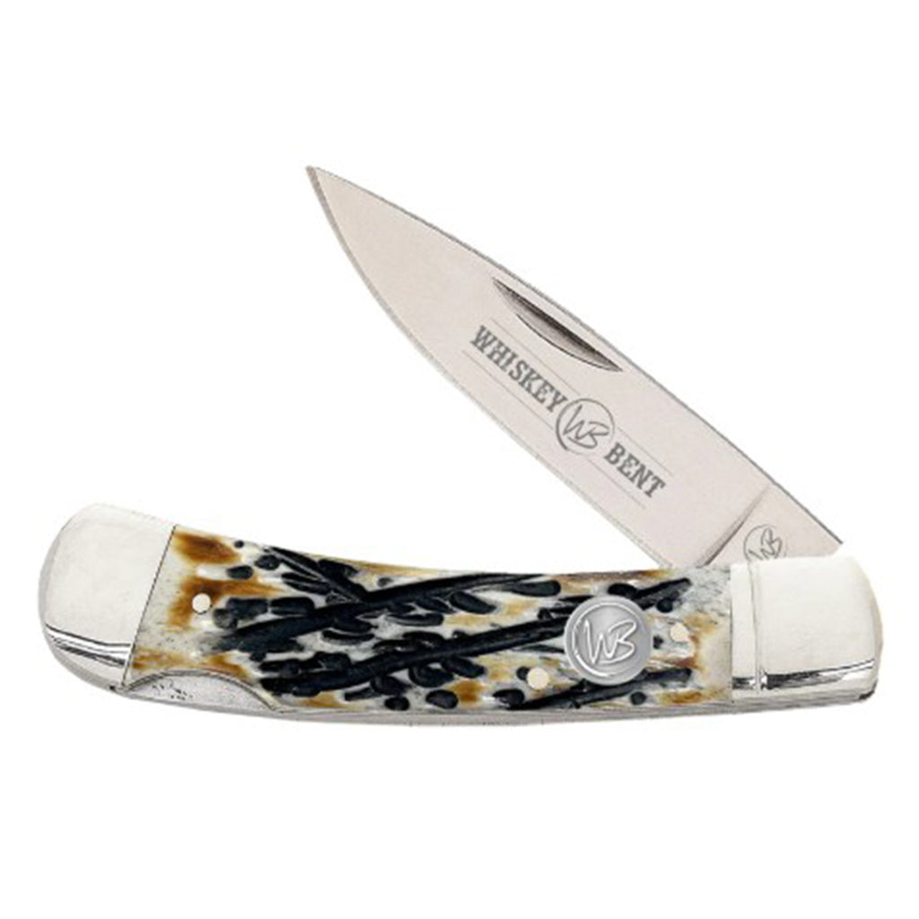 Whiskey Bent pocket knife with burnt carved bone handle on a white background.
