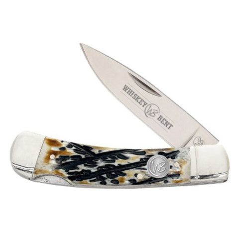 Whiskey Bent pocket knife with burnt carved bone handle on a white background.