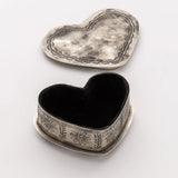 Open Silver Corazon keepsake box displaying the interior storage space and decorative silver exterior.