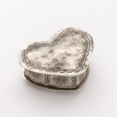 Top view of the Silver Corazon keepsake box showing its detailed stamped silver lid and heart-inspired design.
