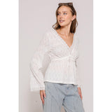women's blouse with textured fabric and lace accents side view
