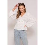 women's blouse with textured fabric and lace accents