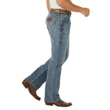 Side view of Wrangler Men's Retro Medium Wash Greely Jeans 