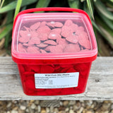 Red container with pink heart-shaped  Horse treats