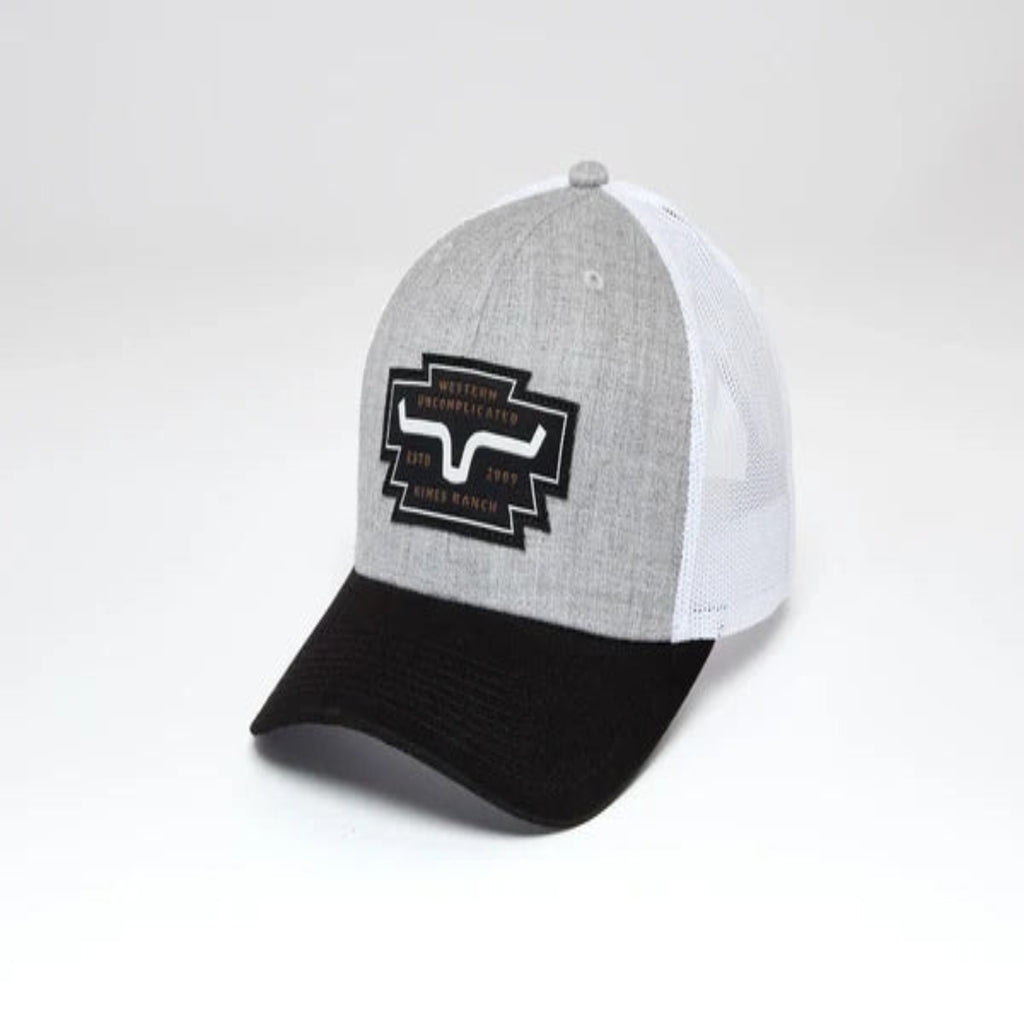 Kimes Ranch Woodland unisex hat with a structured crown, curved bill, adjustable snapback closure, and leather Kimes Ranch logo patch.