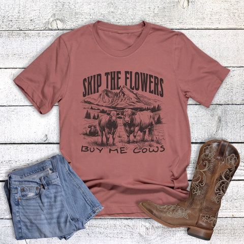 Flat lay view of Skip The Flowers Buy Me Cows T-shirt 