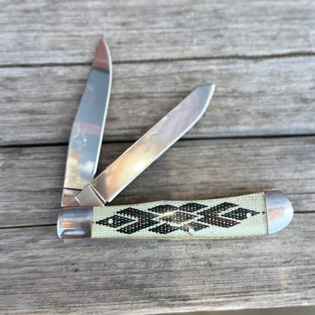 Two blade smooth pocket knife with southwest pattern handle.