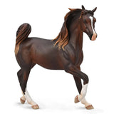 Brown horse figurine with a white blaze