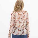 Back side view of cream long sleeve horse print mesh shirt