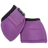 Pair of violet DyNo turn bell boots with black top on white background.