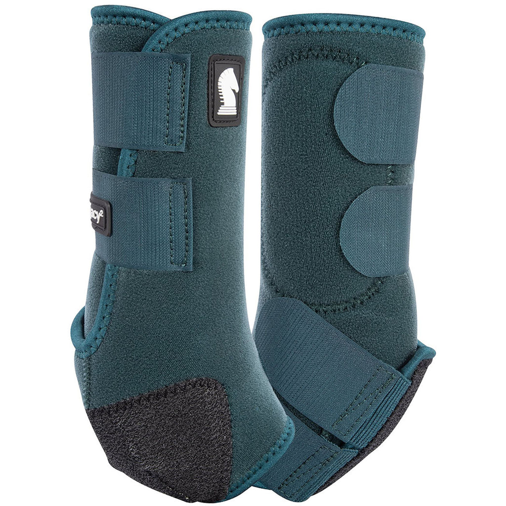 Pair of teal protective horse boots on a white background