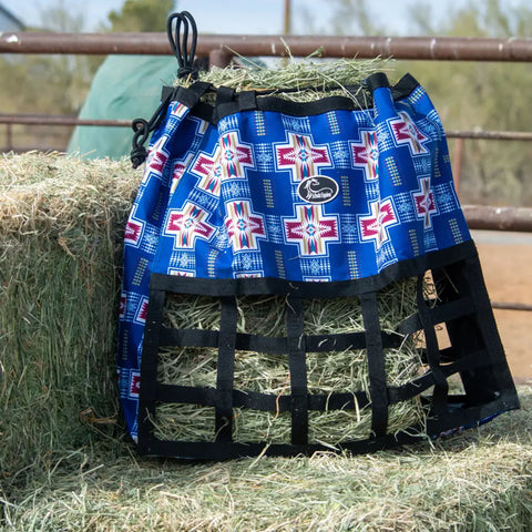 Dark Blue Round Up Hay Bag filled with hay