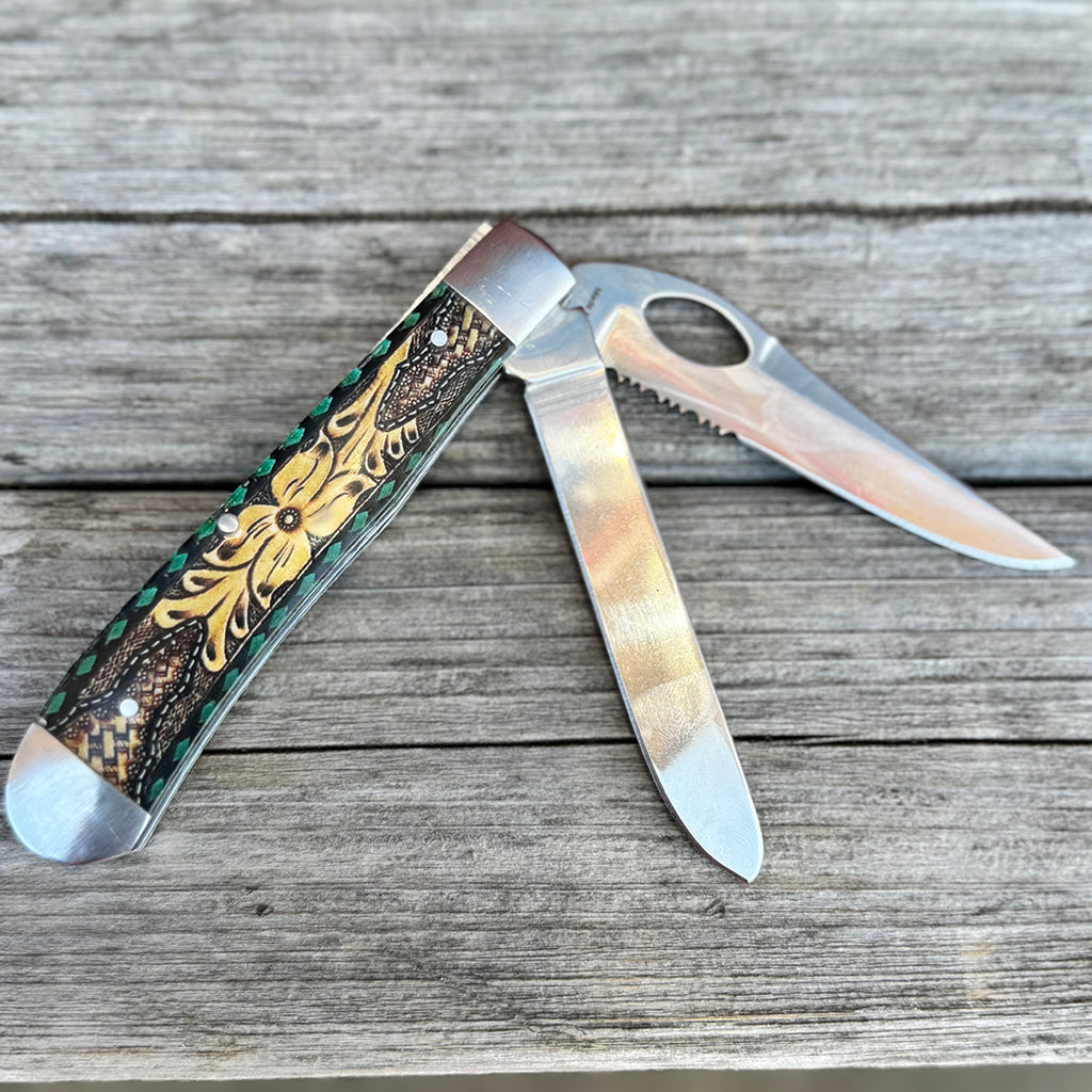 Two blade pocket knife with floral billet buck stitch pattern handle. 