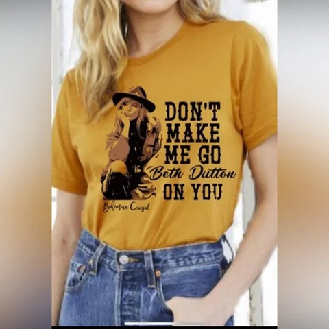 Model front facing wearing yellow t-shirt with Beth Dutton picture and phrase. 