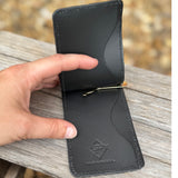 Inside of gray ostrich money clip with card holder.