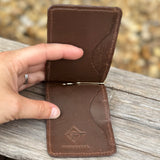 Inside of card holder with money clip.