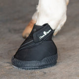 Close up of black medicine boot on horse