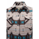 Close-up of turquoise and charcoal Aztec pattern on soft brushed fabric of Western-style jacket