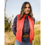 Woman wearing Red Paisley Wilona Vest in rustic outdoor setting