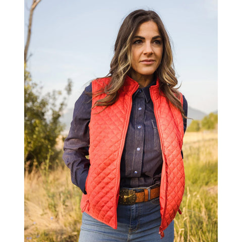 Woman wearing Red Paisley Wilona Vest in rustic outdoor setting