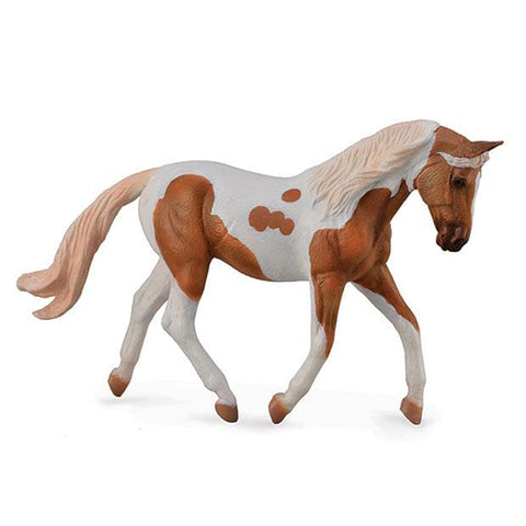 Model horse with brown and white pattern