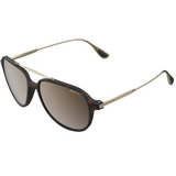 Bex Kabb Sunglasses. They have a tortoise brown frame and brown tinted lenses with a silver flash.