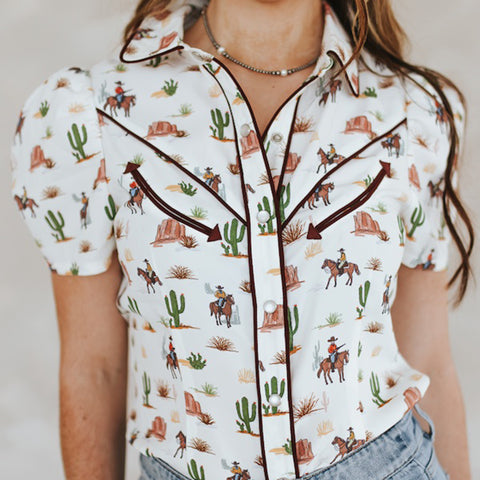 Model wearing cream western desert front facing. 