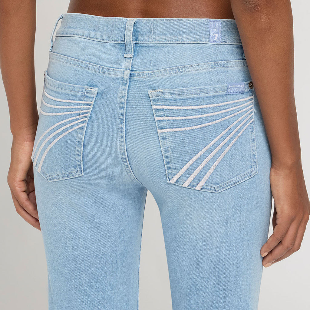 Close up view of the back pockets on the jeans. 