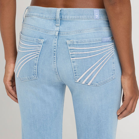 Close up view of the back pockets on the jeans. 