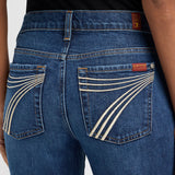 Close up view of the back pockets on the Indiglow Tailorless Jeans