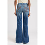 Back view of model wearing the 7 For All Mankind Blue Core Bronze Dojo Jean showing the signature Dojo pockets and clean stitching details.