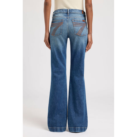 Back view of model wearing the 7 For All Mankind Blue Core Bronze Dojo Jean showing the signature Dojo pockets and clean stitching details.