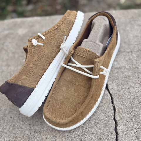 Pair of Hey Dude Wendy Teton Debossed Brown Shoes.