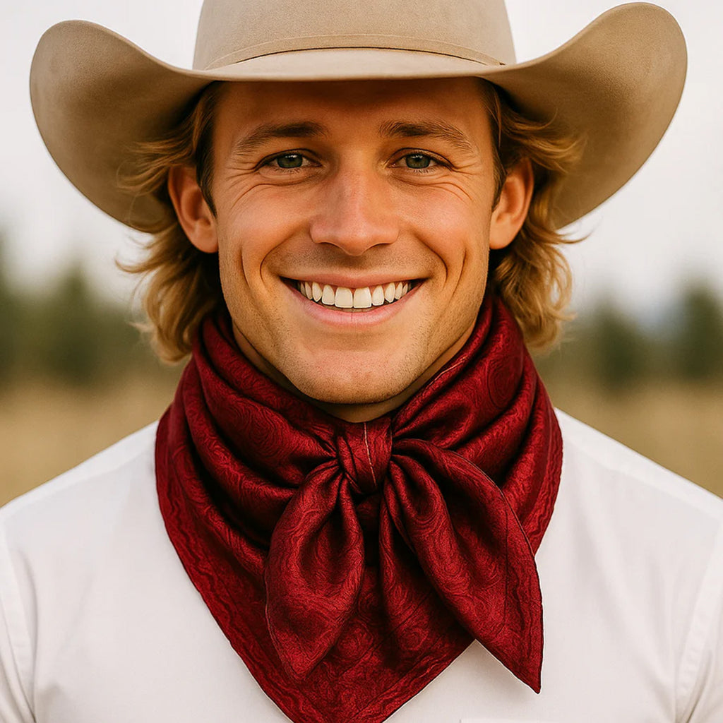 Model wearing the Burgundy Jacquard Wild Rag tied at the neck, showing the rich woven pattern.