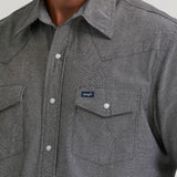 Close up pocket view of Wrangler Men's Gray Chambray Short Sleeve Snap Shirt 