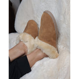 Minnetonka Moccasins Tan Sheep Skin Mule Slippers
