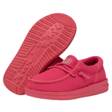A pair of completely reddish pink HEYDUDE shoes. One of the shoes is at a side angle, while the other one is angled to where its outsole is completely visible.