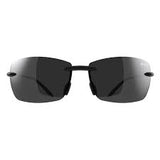 Bex Jaxyn X Sunglasses. They have a black frame and gray tinted lenses.